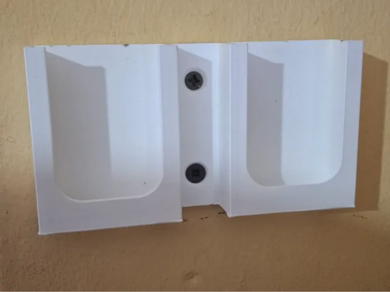 Double wall remote control holder