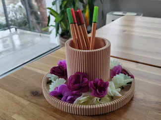 Pencil holder for a signing table.