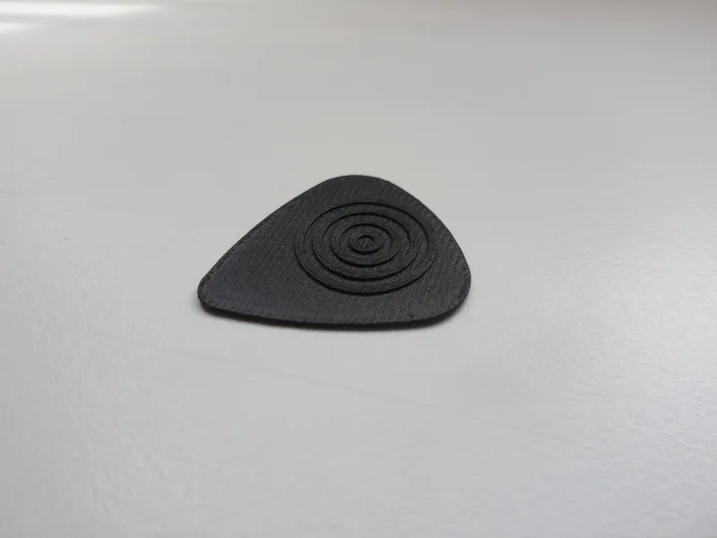 Plektrum / Pic für Gitarre / Bass 0.6mm