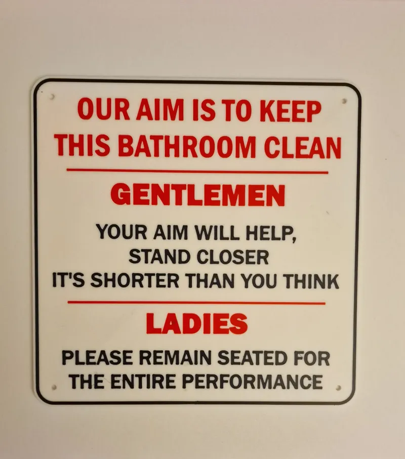 Sign "Our aim is to keep this bathroom clean"