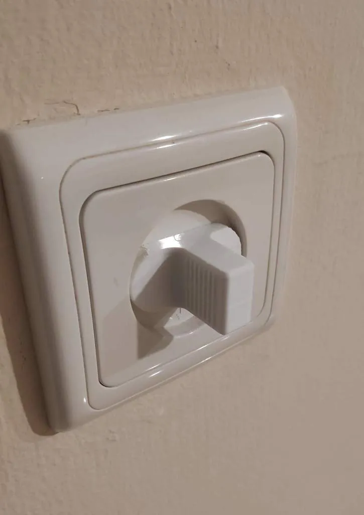 Cache de sécurité pour prise électrique européenne
