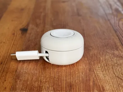 Compact apple watch wind up travel charger holder