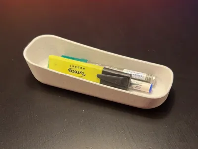 Simple rounded pen & clutter tray