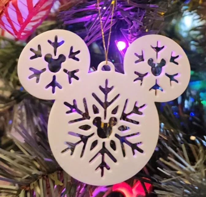 Mickey Mouse head with snowflakes