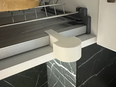 Drying rack door stopper
