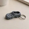 Keychain L&R with hole (0.2mm layer, 2 walls, 12% infill)