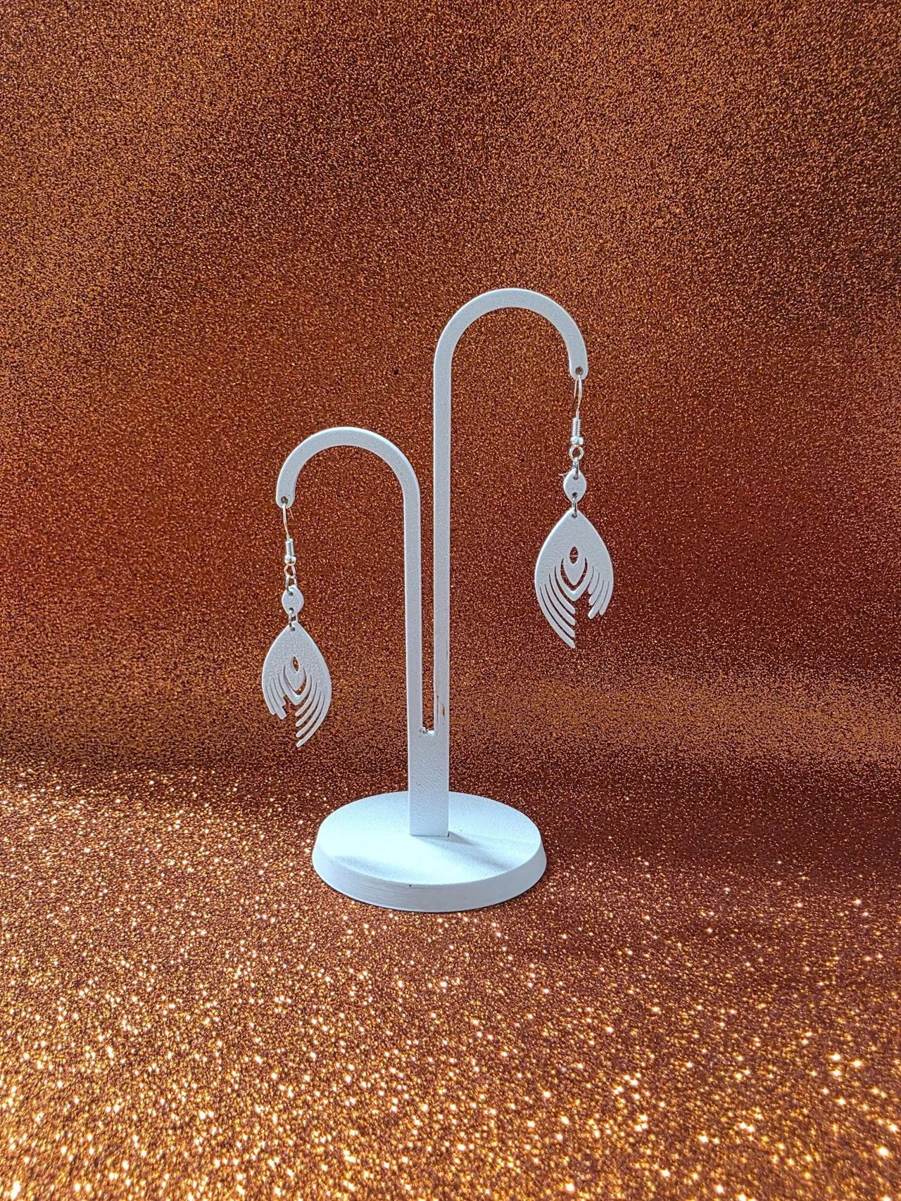 Minimal peacock feather earrings view 3