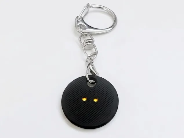 Squash ball key ring - 2 yellow dots