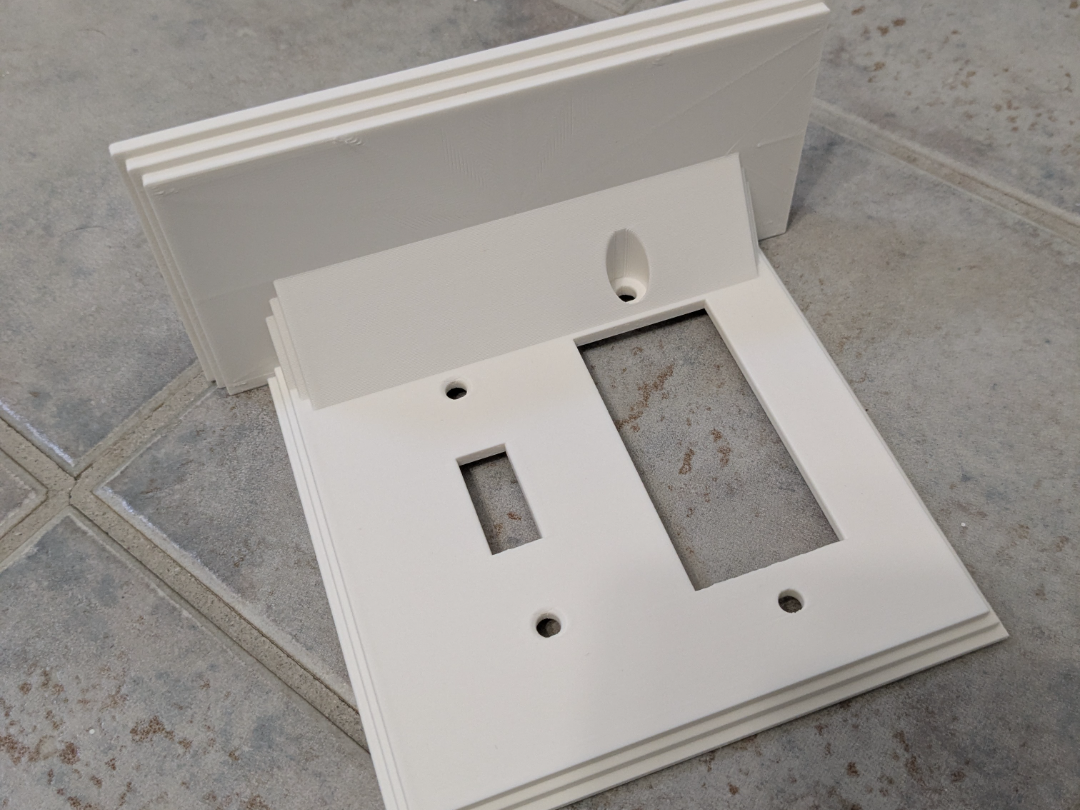 Double switch plate shelf for switch and outlet
