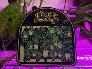 Peace Grows Here wall hanging