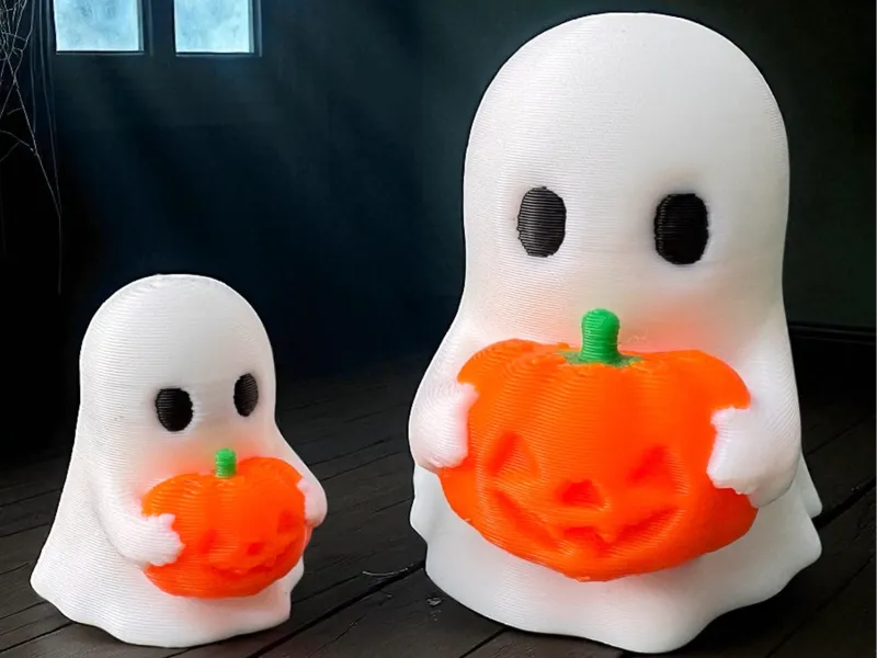 Halloween cute Ghost holding a pumpkin