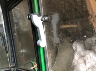 Tractor window handle