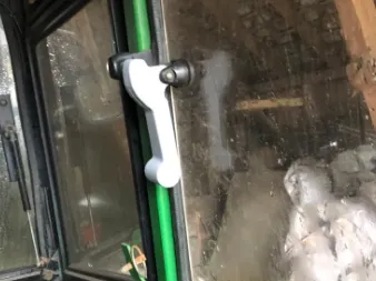 Tractor window handle