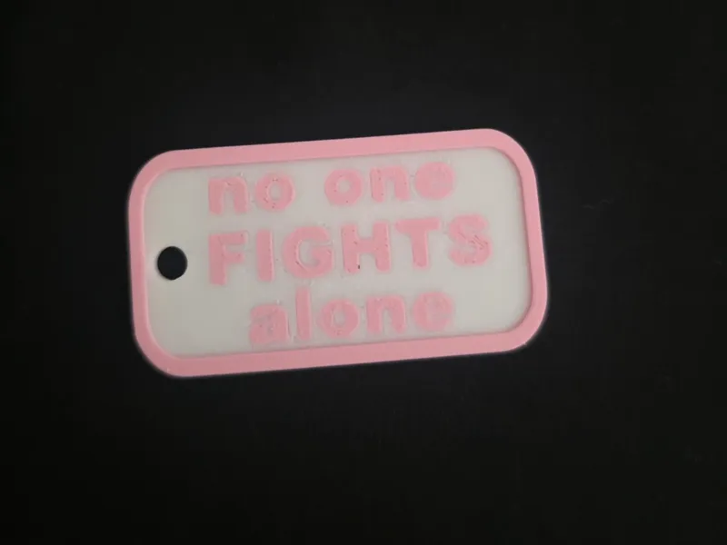Cancer keychain no one fights alone