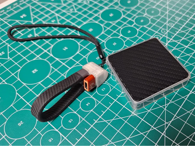USB cable and adapter lanyard for SSD enclosure