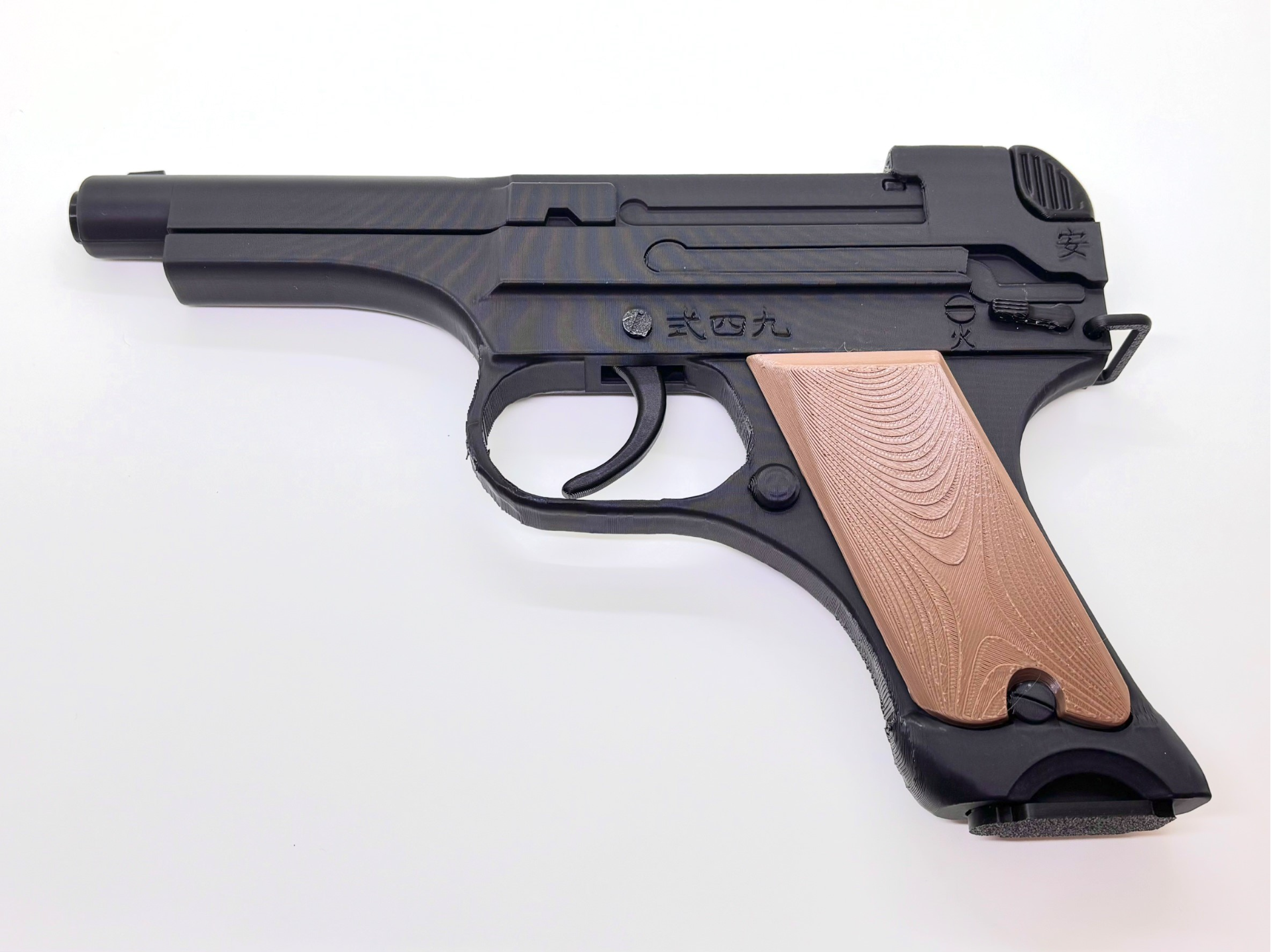 WW II Japanese Type 94 Nambu Toy Pistol Grip - 1