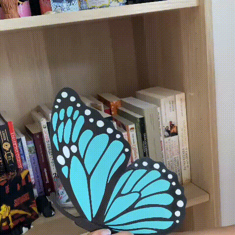 Monarch Butterfly folding had fan 