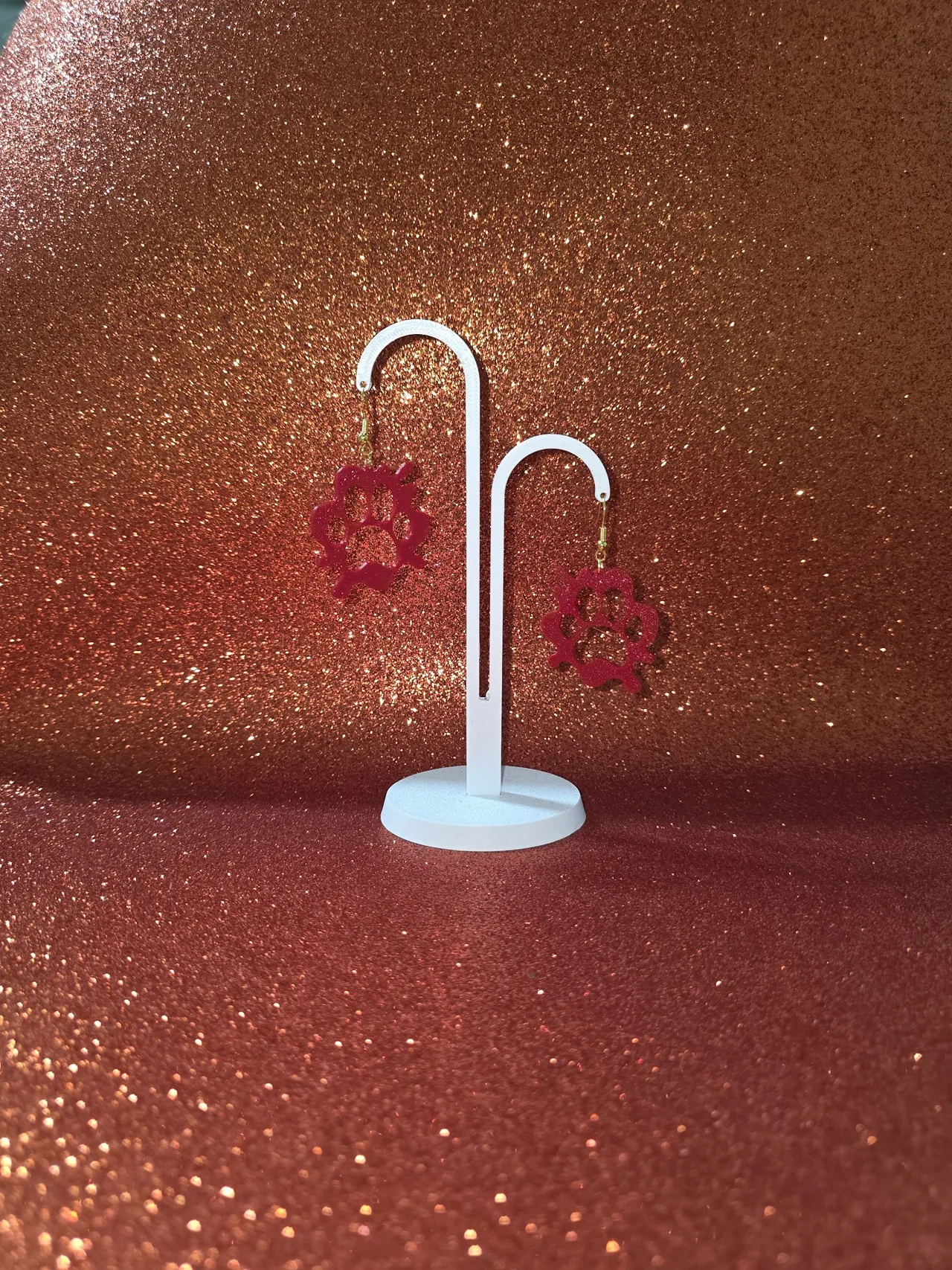 Painted paw puddle earrings view 3