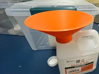 Desiccant bead funnel attachment