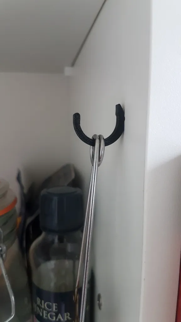 Bookshelf hook for shelf holes