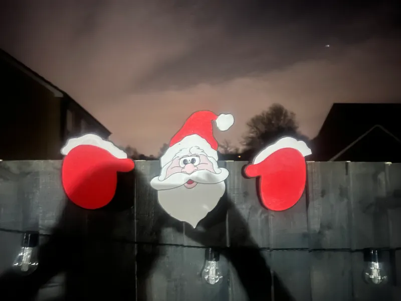Santa Fence Peeker