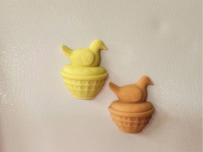Duck on a basket magnet