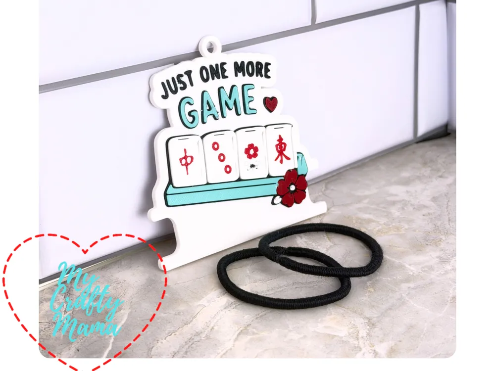 Accesorio para sujetar ligas de cabello: Mahjong Tile Hair Tie Key Chain Holder. Referencia del modelo original.