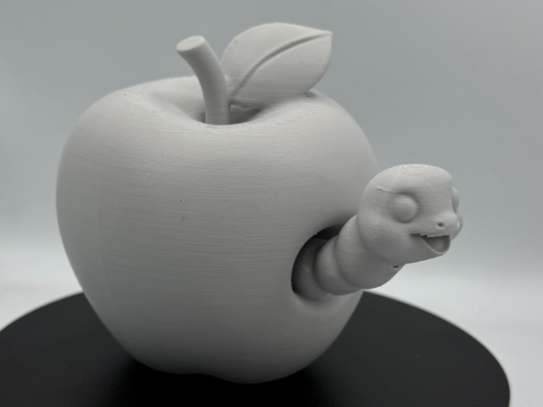 Whimsical Apple with Friendly Worm 