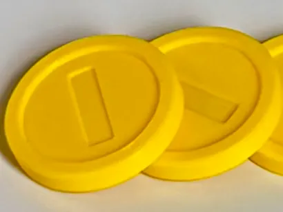 Coins often found on kart courses (double-sided)