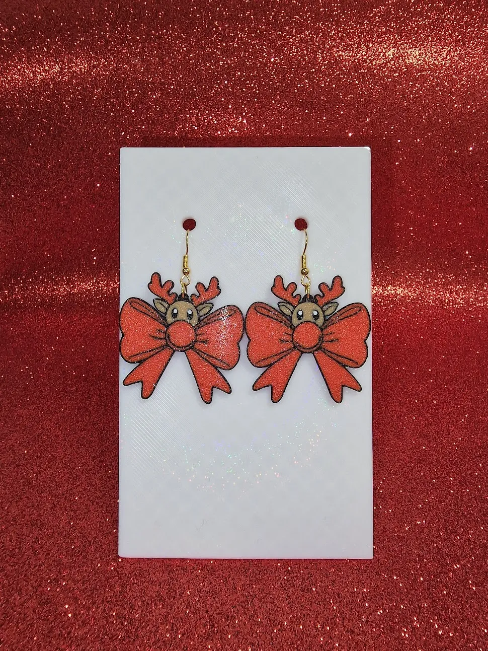 Christmas bow reindeer earrings view 2
