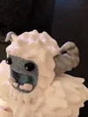 Different colored horns and white eyes