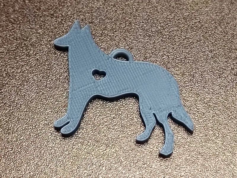 Dog with heart keychain