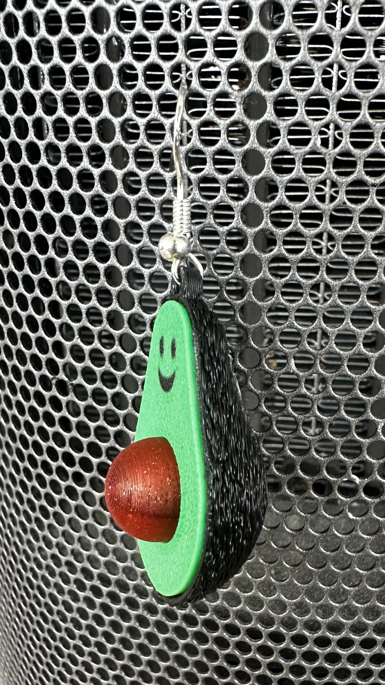 Smiling avocado earring view 2