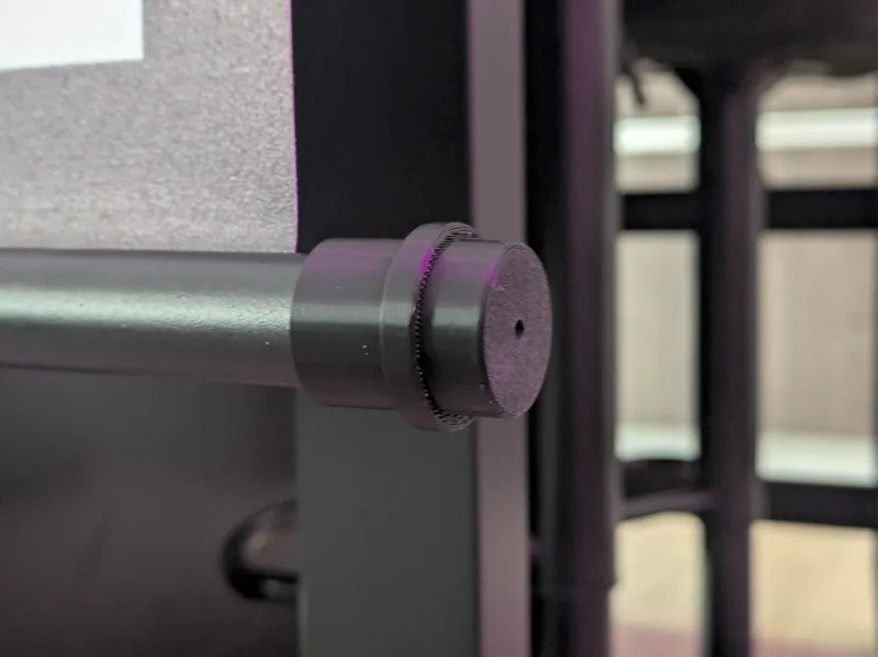Roll up projector screen end caps