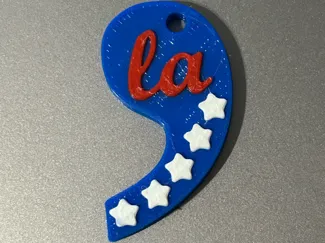 Comma-la Kamala Harris keychain