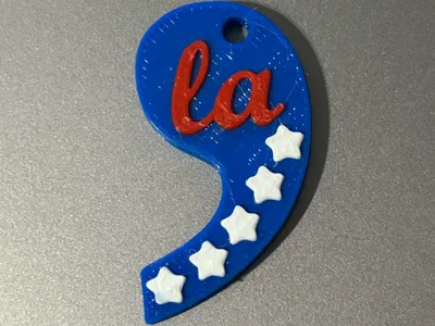 Comma-la Kamala Harris keychain