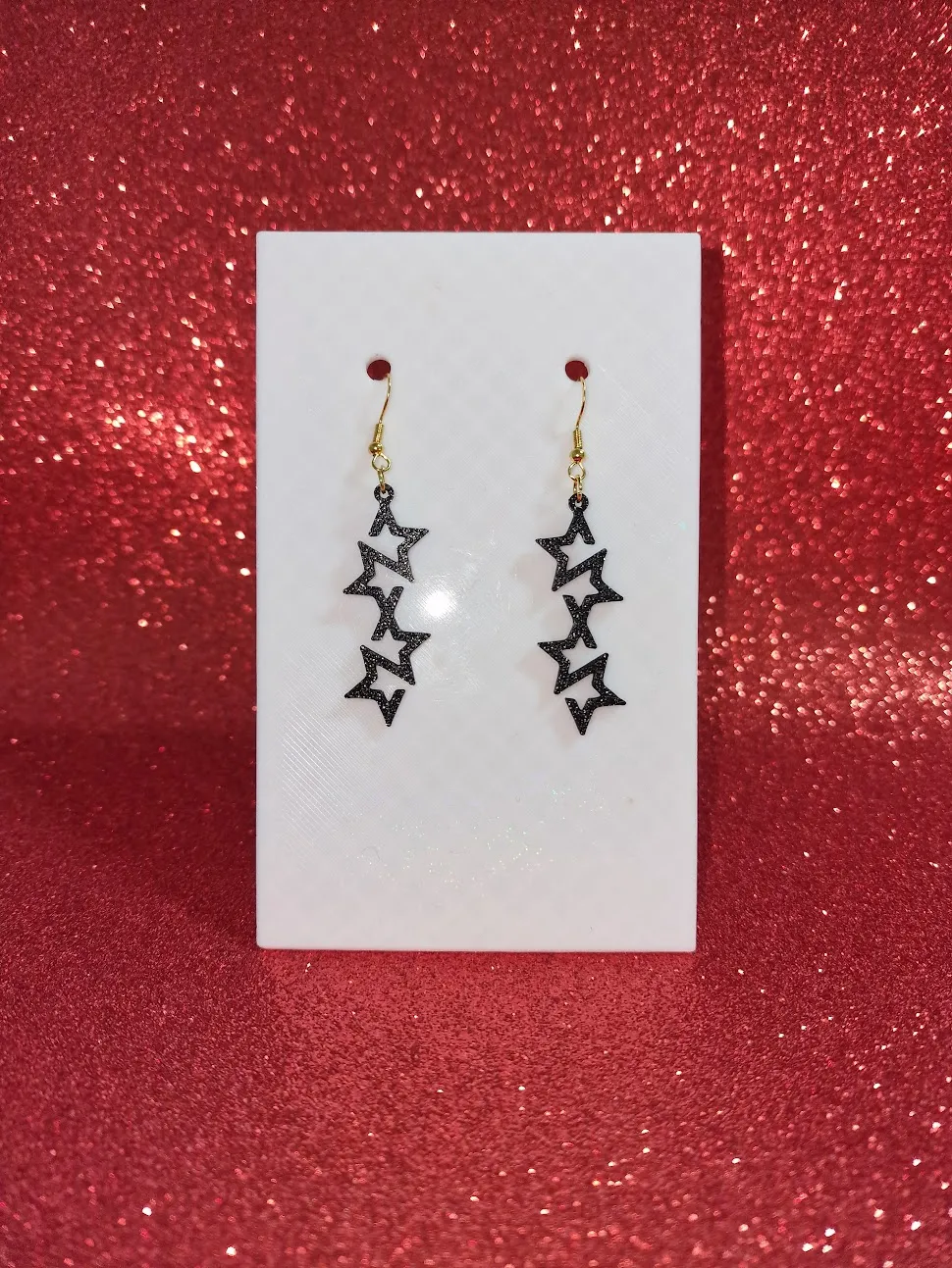 Open stars earrings view 2