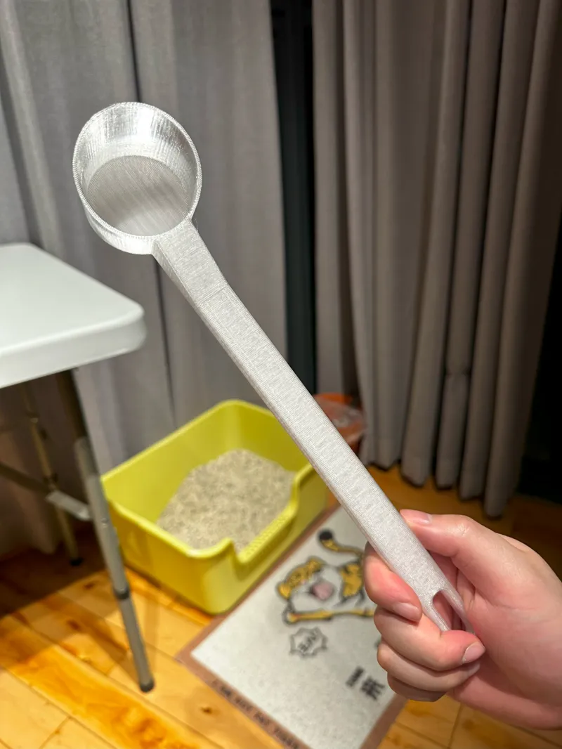 Extra-long spoon for cat food