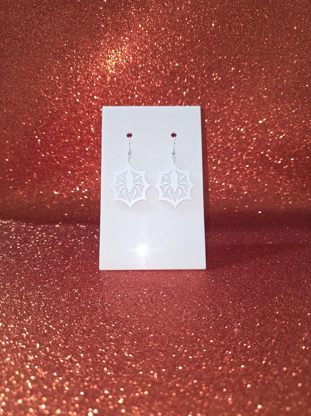 Spider in web earrings view 2