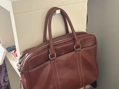 Laptop bag holder