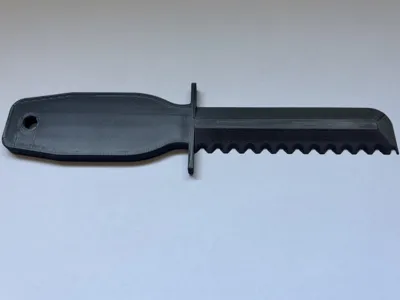 Mower Deck Scraper with Serrated Edge