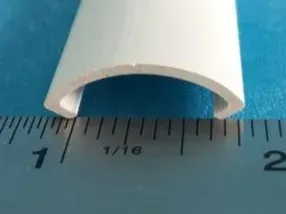 Pool stair gasket cover plate extrusion