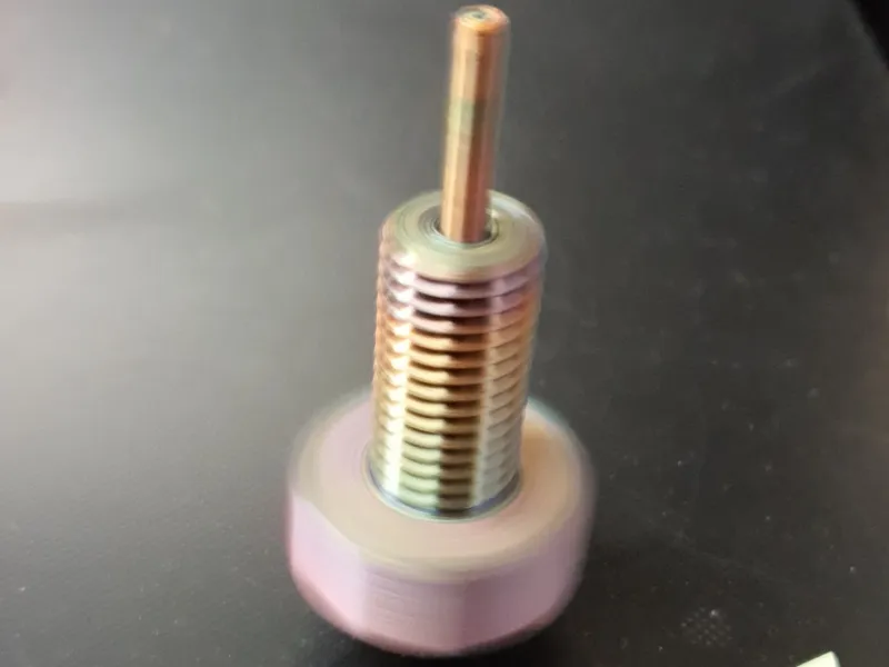 Nozzle Spinning Top
