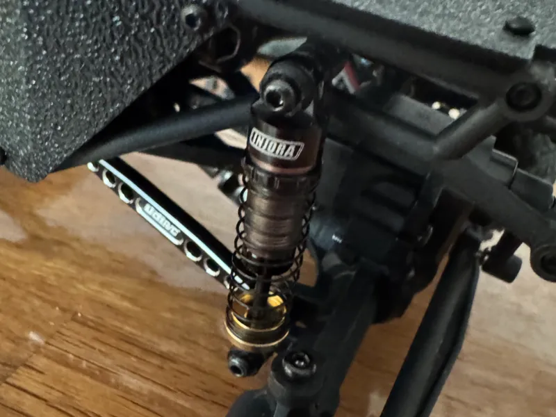 Injora Shock Adapter for UCX2405 Pro