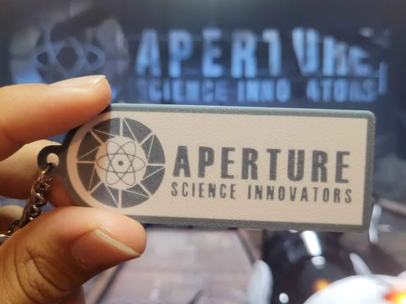 Aperture Science innovators logo keychain