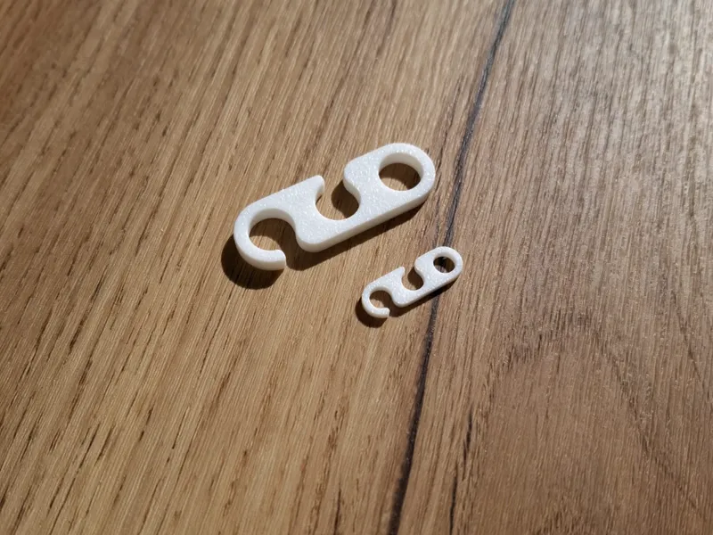 Schnurspanner (System für variable Schnurlängen)
