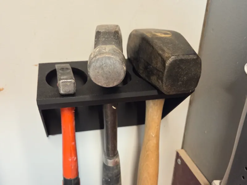 Universal three hammer organizer hanger 