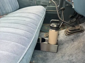Bench seat cup holder