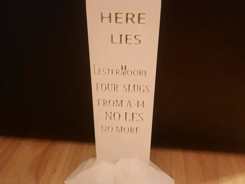 tombstone Les Moore