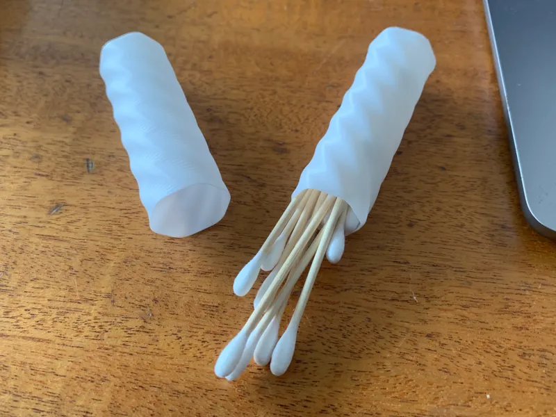 Travel container for Q-tips / cotton buds